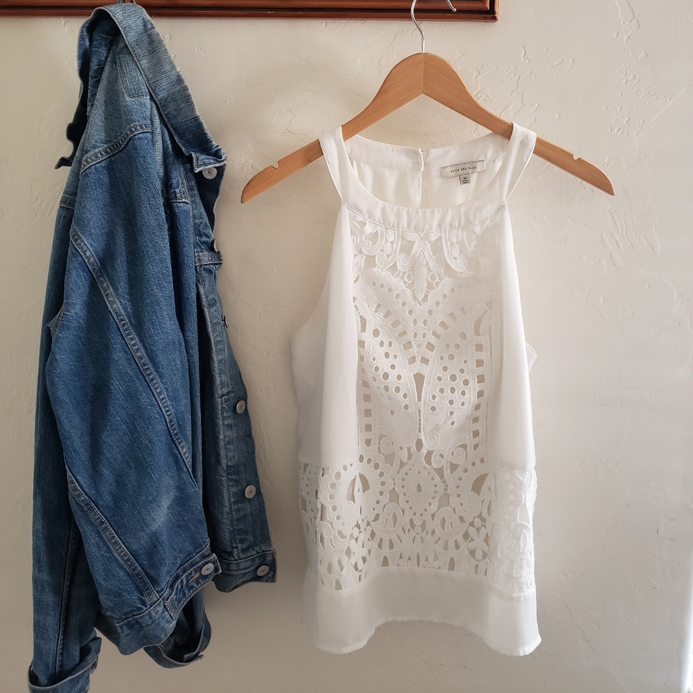 White sleeveless top